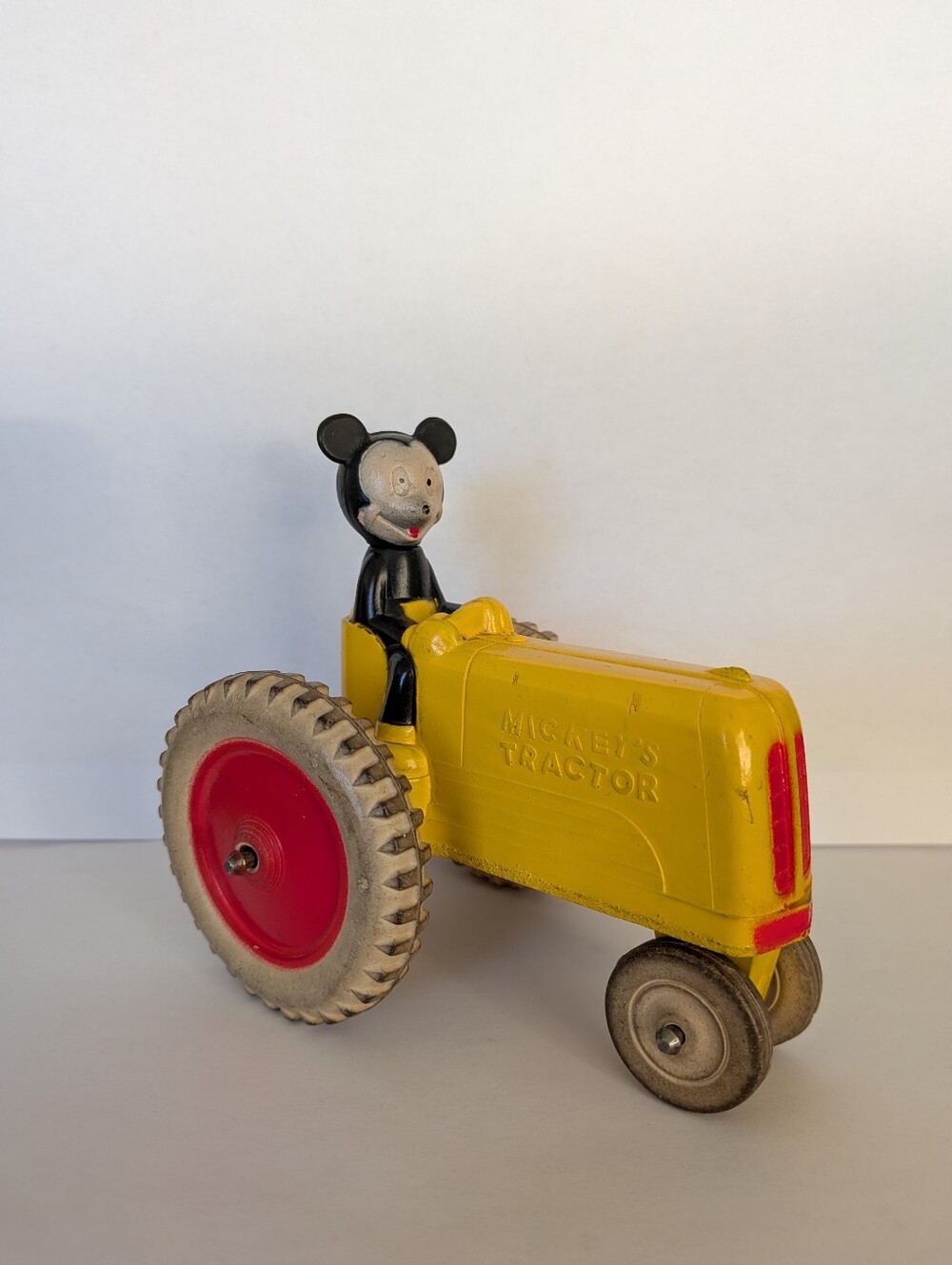 Rare Disney Mickey Mouse Vintage Yellow Mickey's Tractor Toy with Red Wheels